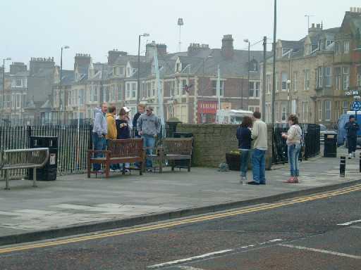 Posing for pictures on the sea front