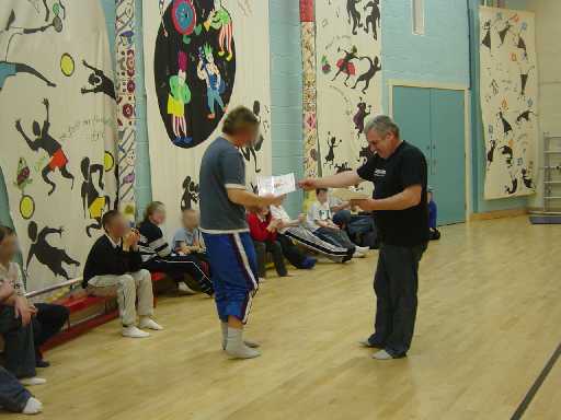 Handing out certificates at youth club